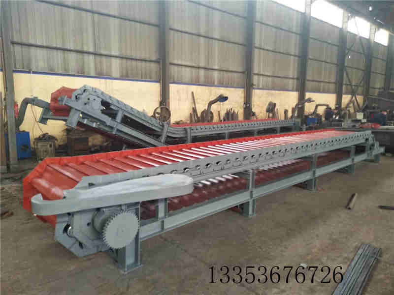 破碎后的礦石塊料鏈板式喂料機